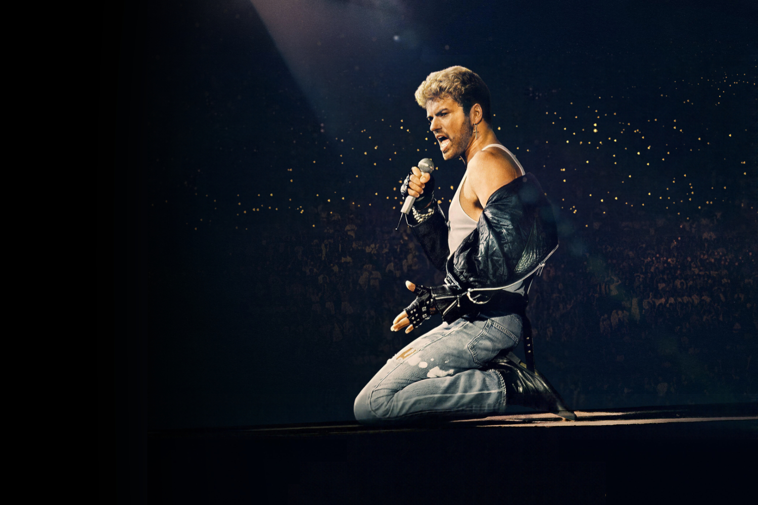 UNA RAPPRESENTAZIONE DI GEORGE MICHAEL IN CONCERTO
